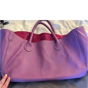 Beck bag and wristlet purple fouffy color gently used